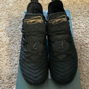 Nike Lebrons size 4y Black and gold